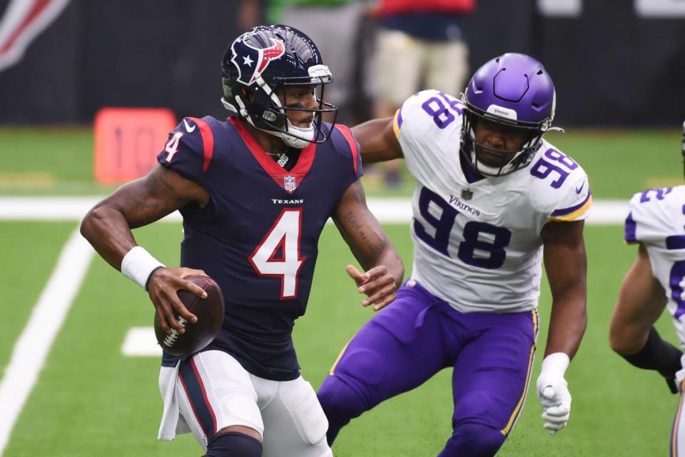 Houston Texans quarterback Deshaun Watson (4) is pressured by Minnesota Vikings defensive end D.J. Wonnum (98) during the first half of an NFL football game Sunday, Oct. 4, 2020, in Houston. (AP Photo/Eric Christian Smith)