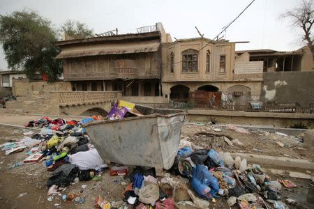 Garbage seen in front of one of the ancient historic houses dated back to the time of Ottomans in the old downtown of Basra, Iraq May 9, 2018. REUTERS/Essam al-Sudani