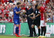 Football Soccer Britain - Leicester City v Manchester United - FA Community Shield - Wembley Stadium - 7/8/16 Manchester United's Marcos Rojo waits to come on as substitute as manager Jose Mourinho shares a joke with Leicester City's Christian Fuchs Action Images via Reuters / John Sibley Livepic EDITORIAL USE ONLY. No use with unauthorized audio, video, data, fixture lists, club/league logos or "live" services. Online in-match use limited to 45 images, no video emulation. No use in betting, games or single club/league/player publications. Please contact your account representative for further details.