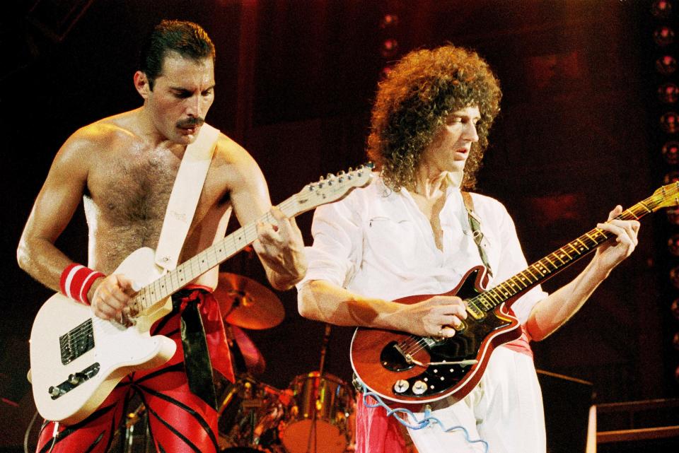 UNITED KINGDOM - SEPTEMBER 01:  WEMBLEY ARENA  Photo of QUEEN, Freddie Mercury and Brian May performing on stage  (Photo by Phil Dent/Redferns)