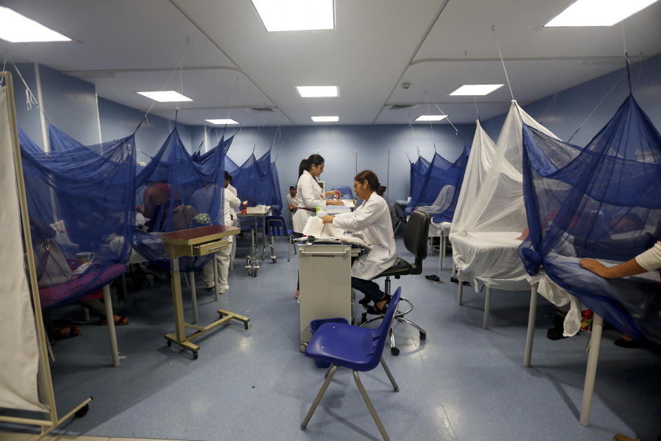 In this photo taken on Sept. 5, 2019, patients receive treatment for dengue inside a room at the Fernando Velez Hospital in Managua, Nicaragua. As a region, Central America and Mexico have already recorded nearly double the number of dengue cases as in all the previous year. Guatemala, Mexico and Nicaragua have seen double-digit death tolls. (AP Photo/Alfredo Zuniga)