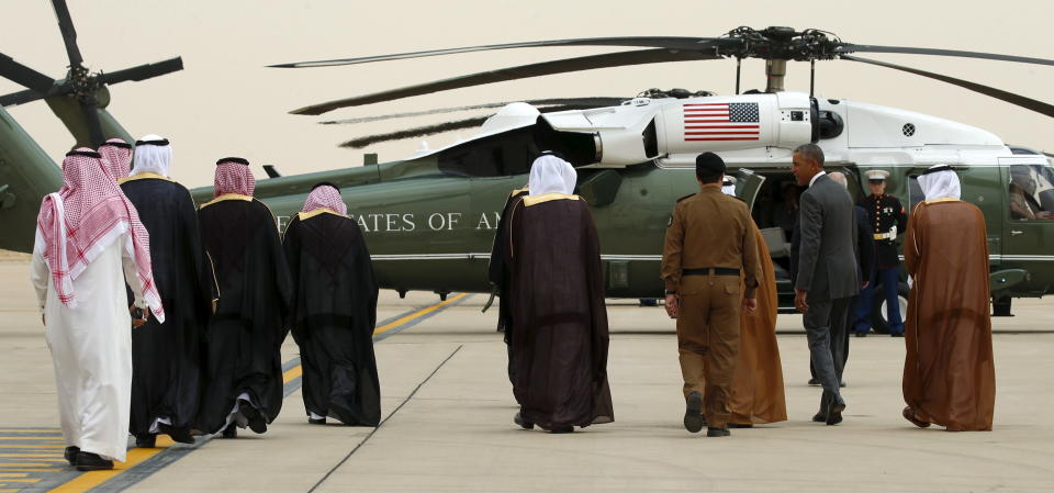 Obama walks toward Marine One upon his arrival at King Khalid International Airport for a summit meeting in Riyadh, Saudi Arabia.