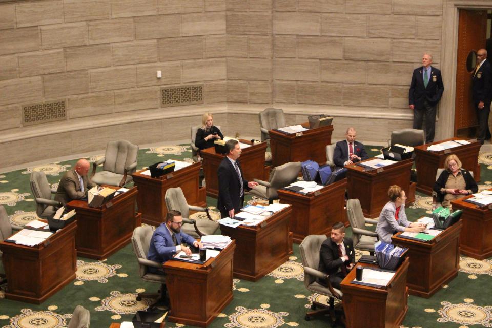 Sen. Mike Moon (center), a Republican from Ash Grove, stands on the Missouri Senate floor to speak about his legislation in Jefferson City on Feb. 27, 2023. Moon has been one of the most vocal proponents in the chamber for banning gender-affirming care for transgender minors in Missouri.