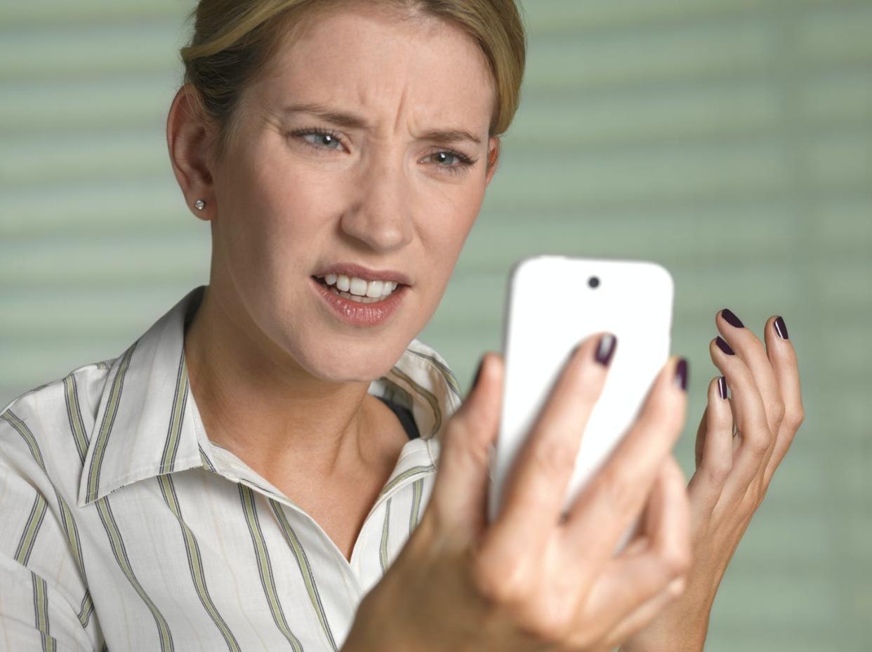 <span class="caption">New research aims to give phone companies tools to help curb robocalls.</span> <span class="attribution"><a class="link " href="https://www.gettyimages.com/detail/photo/unhappy-woman-on-smart-phone-royalty-free-image/523191935?adppopup=true" rel="nofollow noopener" target="_blank" data-ylk="slk:Peter Dazeley/The Image Bank via Getty Images;elm:context_link;itc:0">Peter Dazeley/The Image Bank via Getty Images</a></span>