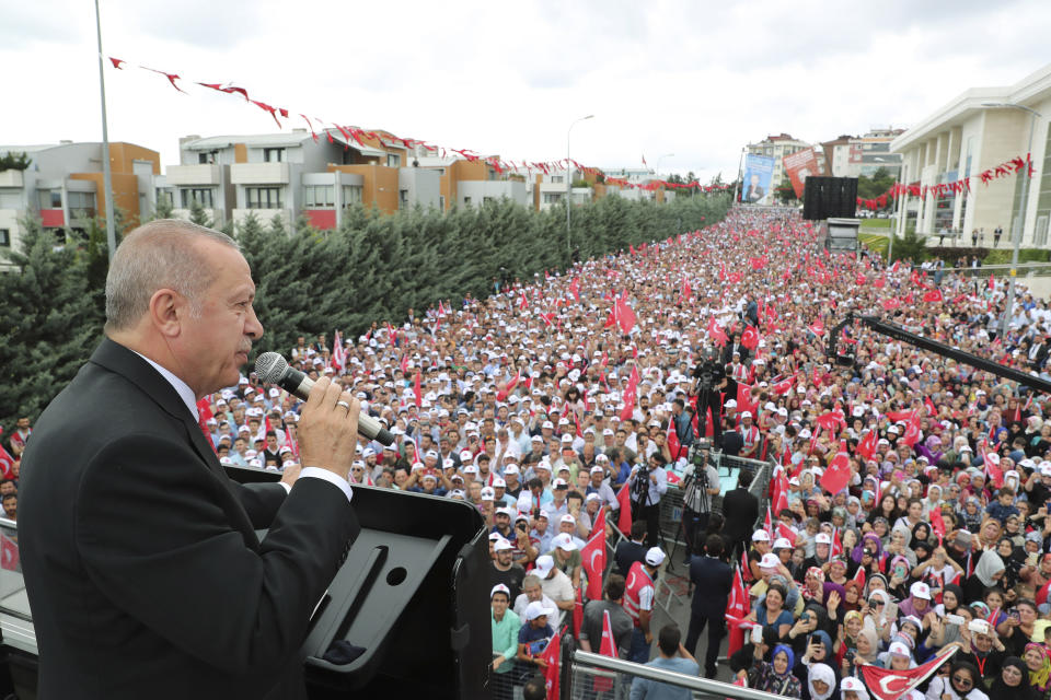 Turkey's President Recep Tayyip Erdogan, talks to supporters during a campaign rally in Istanbul for the June 23 re-run of Istanbul elections, Wednesday, June 19, 2019. Erdogan has claimed that former Egyptian President Mohammed Morsi did not die of natural causes but that he was killed. At the campaign speech Erdogan offered as evidence the fact that the deposed president allegedly "flailed" in court for 20 minutes and that nobody assisted him. (Presidential Press Service via AP, Pool)