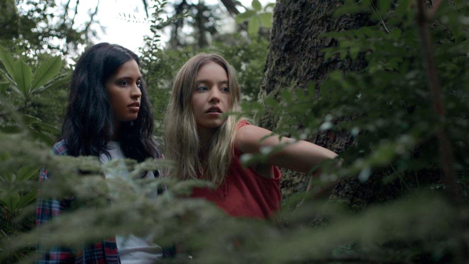 Karen (left, Otmara Marrero) hides away at her ex's lakehouse and meets the enigmatic Lana (Sydney Sweeney) in "Clementine."