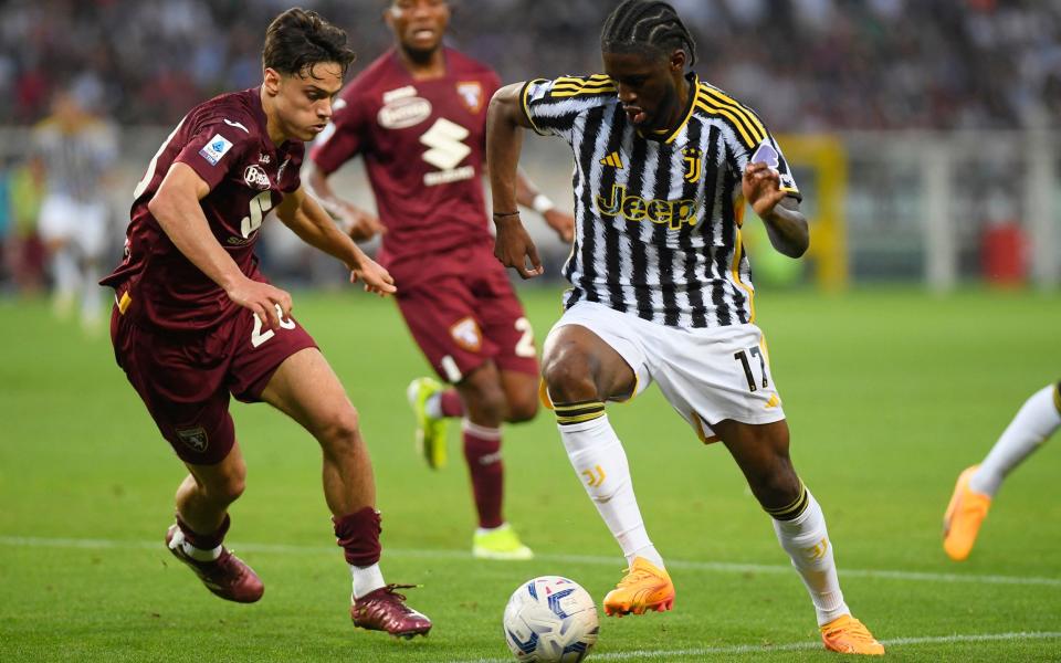 Torino's Samuele Ricci in action with Juventus' Samuel Iling-Junior