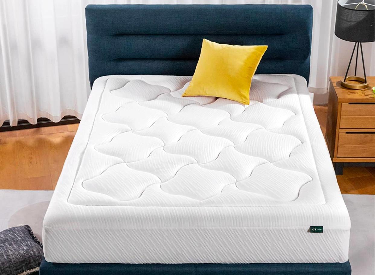 This plush mattress will make it feel like you're sleeping on a cloud. (Source: Amazon)