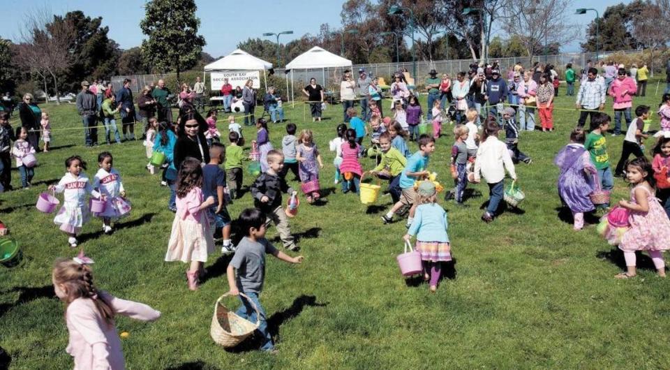 Hundreds of kids take part in an Easter egg hunt at the South Bay Community Center in Los Osos in 2013. Easter egg hunts are scheduled across San Luis Obispo County in April 2023.