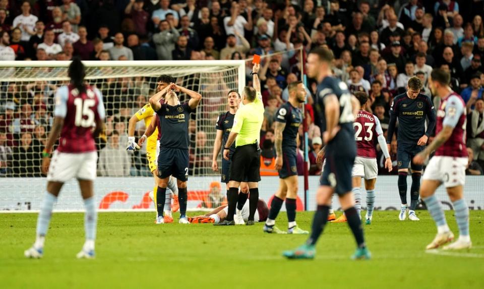 Burnley’s Matt Lowton reacts as he is shown a red card (Mike Egerton/PA) (PA Wire)