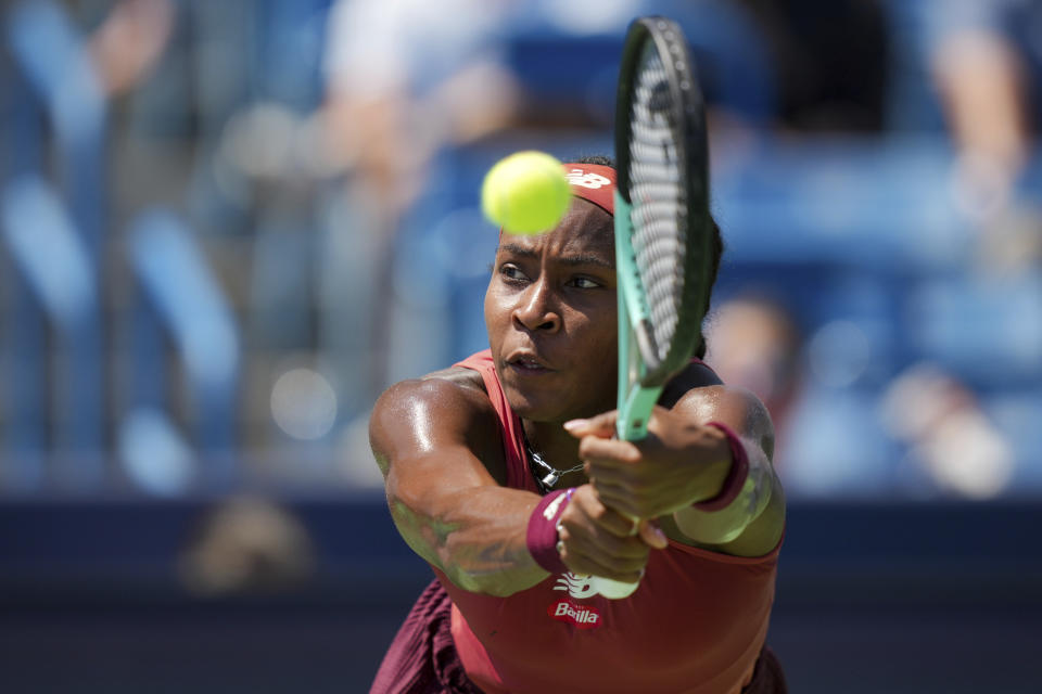 FILE - Coco Gauff returns a shot to Karolina Muchova, of the Czech Republic, during the women's singles final of the Western & Southern Open tennis tournament, Sunday, Aug. 20, 2023, in Mason, Ohio. Gauff is one of the women to watch at the U.S. Open, which begins at Flushing Meadows on Aug. 28.(AP Photo/Aaron Doster, File)