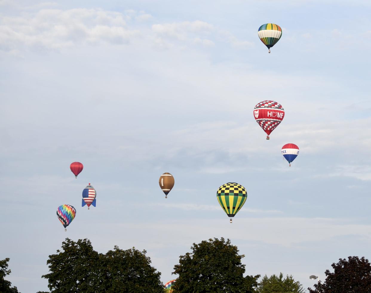 Hot air balloons dot the sky during the 2023 Balloon Classic. This year's event will be July 26-28, launching from the campus of Kent Stark University at Stark in Jackson Township