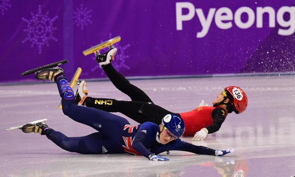 Britain’s Elise Christie falls in the 1500m short-track speed skating semi-final.