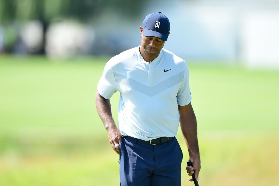 JERSEY CITY, NEW JERSEY - AUGUST 08: Tiger Woods of the United States reacts on the third green during the first round of The Northern Trust at Liberty National Golf Club on August 08, 2019 in Jersey City, New Jersey. (Photo by Jared C. Tilton/Getty Images)