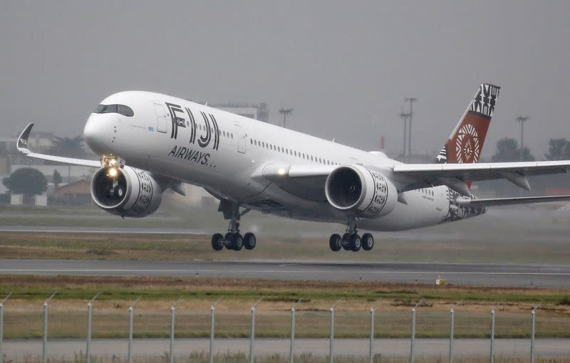 FILE PHOTO: The first Airbus A350 XWB aircraft of Fiji Airways takes off at the aircraft builder's headquarters of Airbus in Colomiers near Toulouse, France