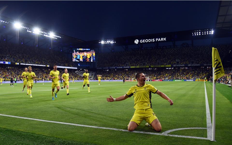 May 18, 2022; Nashville, Tennessee, USA; Nashville SC midfielder Alex Muyl (19) celebrates after a goal during the first half against the CF Montreal at GEODIS Park.