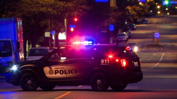 Three Vancouver police officers are facing charges over allegations stemmingfrom arrest of a cyclist who fled after being spotted without helmet, lights and reflectors. (GP Mendoza/CBC - image credit)