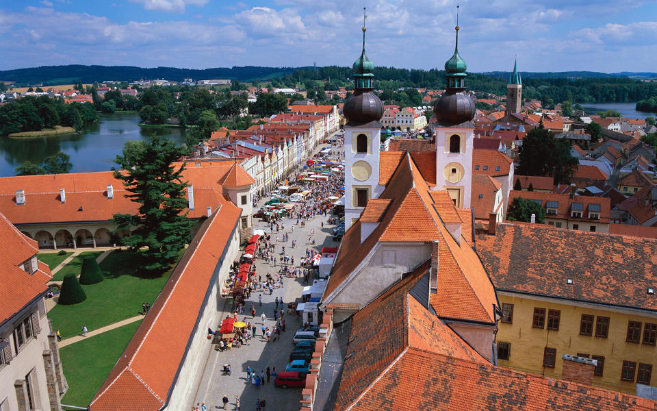 <p>Residents of Tel?, a small town in south Moravia, were once quite competitive about the beauty of their homes, as is evident today on the elongated main square, where one building is lovelier than the next. The Baroque- and Renaissance-style fa?ades, featuring high gables painted in pale pastels, now support small shops and cafes. A grand Renaissance-era ch?teau and large fish-filled ponds surround the square.</p>