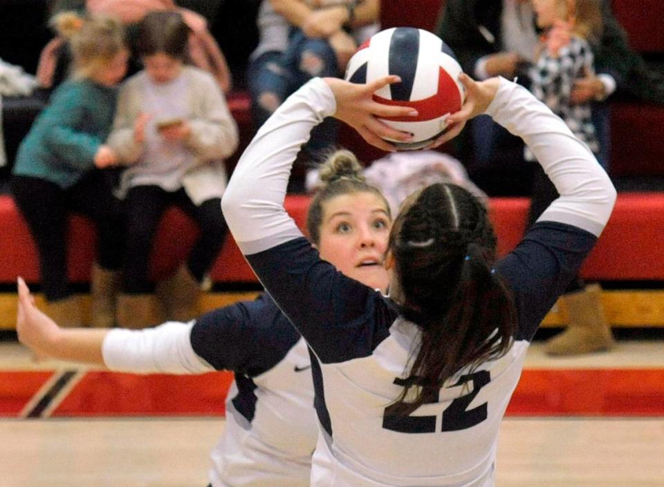 Philipsburg-Osceola’s Madison Lumadue (22) sets a ball for Reese Hazelton on Saturday. The Philipsburg-Osceola girls volleyball team won the PIAA Class 2A state championship Saturday at Cumberland Valley in Mechanicsburg. P-O defeated Trinity 3-1.