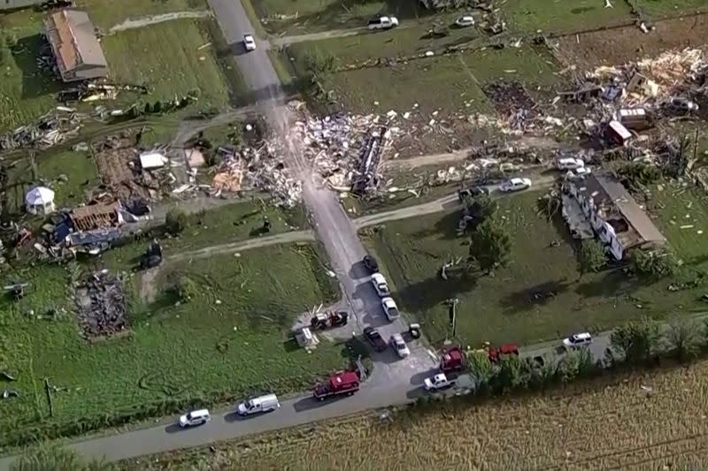 Wreckage is strewn across a property the day after a deadly series of tornados in Texas