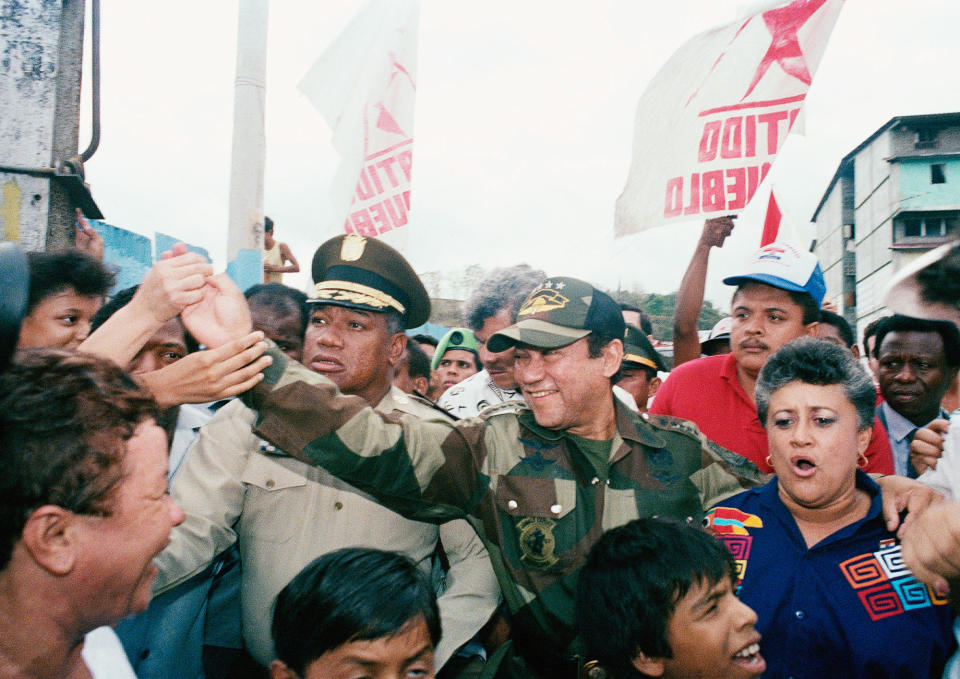 Gen. Noriega greets people at a housing project, 1989