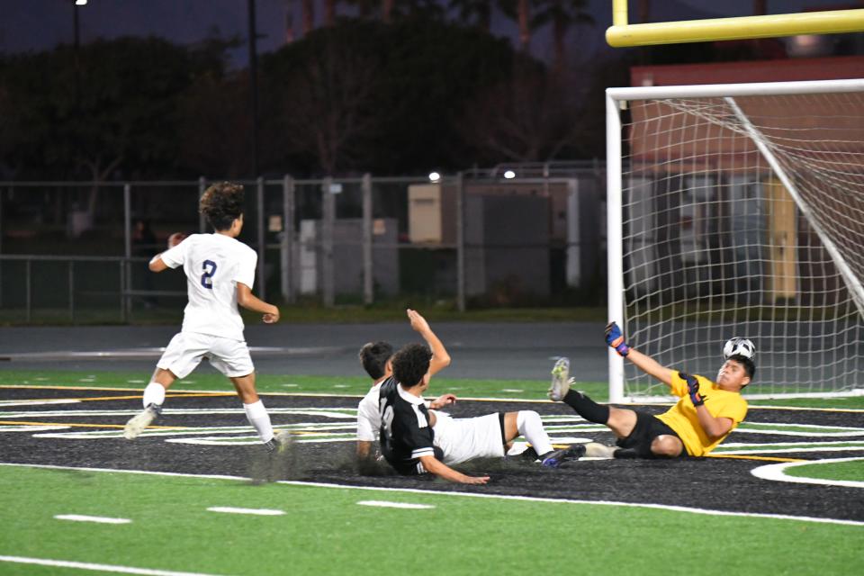 Pacifica's Ian Montelongo scores a goal during the host Tritons' 3-1 Pacific View League win over Channel Islands on Jan. 6.