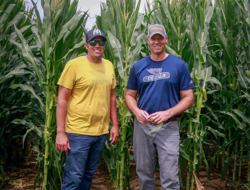 Brothers Andy Rahe, left, and Adam Rahe pose for a photo on July 23, 2022, at the "Field of Dreams" movie site in Dyersville.