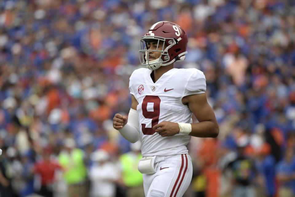 Alabama quarterback Bryce Young (9) jogs to the sideline after a play during the first half of an NCAA college football game against Florida, Saturday, Sept. 18, 2021, in Gainesville, Fla. (AP Photo/Phelan M. Ebenhack)