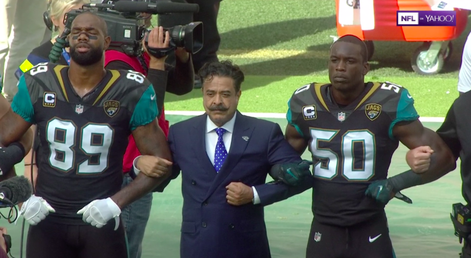 Jacksonville Jaguars owner Shahid Khan joined dozens of football players in a silent demonstration during the national anthem in London on Sunday.