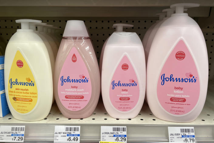 SAN ANSELMO, CALIFORNIA - NOVEMBER 12: Bottles of Johnson & Johnson baby products are displayed on a shelf at a CVS store on November 12, 2021 in San Anselmo, California. Johnson & Johnson announced plans to split its pharmaceutical and medical devices divisions and consumer products into two publicly traded companies. The company hopes to complete the transaction within two years. (Photo by Justin Sullivan/Getty Images)