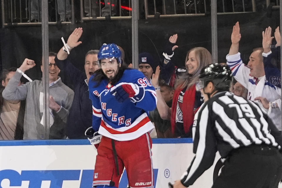 New York Rangers' Mika Zibanejad (93) celebrates after scoring a goal during the first period in Game 2 of an NHL hockey Stanley Cup first-round playoff series against the Washington Capitals, Tuesday, April 23, 2024, in New York. (AP Photo/Frank Franklin II)