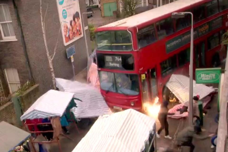 Cliffhanger: a doubledecker bus crashed through Albert Square at the end of Monday's episode (BBC)