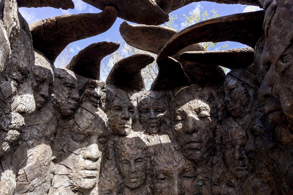 Lionel Smit's bronze and stainless steel piece "Reflection of Self 1" is seen during a media tour of Equal Justice Initiative's new Freedom Monument Sculpture Park, Tuesday, March 12, 2024, in Montgomery, Ala. (AP Photo/Vasha Hunt)