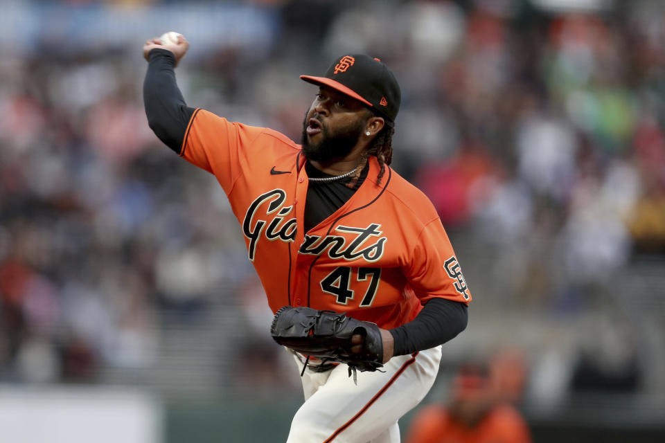 San Francisco Giants' Johnny Cueto throws against the Oakland Athletics during the first inning of a baseball game in San Francisco, Friday, June 25, 2021. (AP Photo/Jed Jacobsohn)