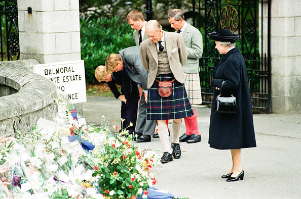 <div class="inline-image__caption"><p>After attending a private service at Crathie Church, Royal family stop to look at floral tributes left for Princess Diana, at the gates of Balmoral Castle. They are: Queen Elizabeth II, Prince Philip, Prince Charles, Prince William, Prince Harry, Peter Phillips.</p></div> <div class="inline-image__credit">Robert Patterson/Mirrorpix/Getty Images</div>