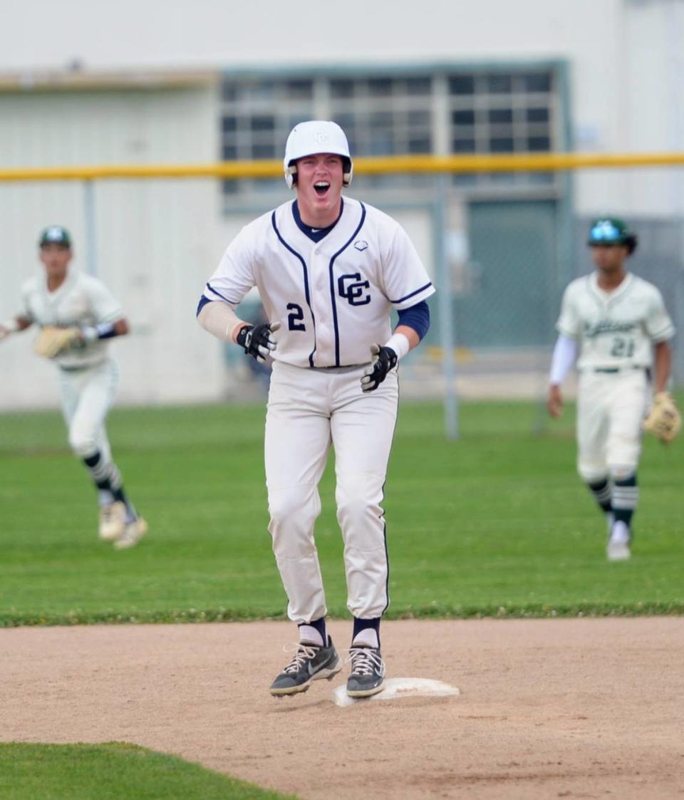 Central Catholic’s Seth Van Dyk celebrates after hitting a double during a Valley Oak League matchup with Manteca at Manteca High School on Friday, April 26, 2024.