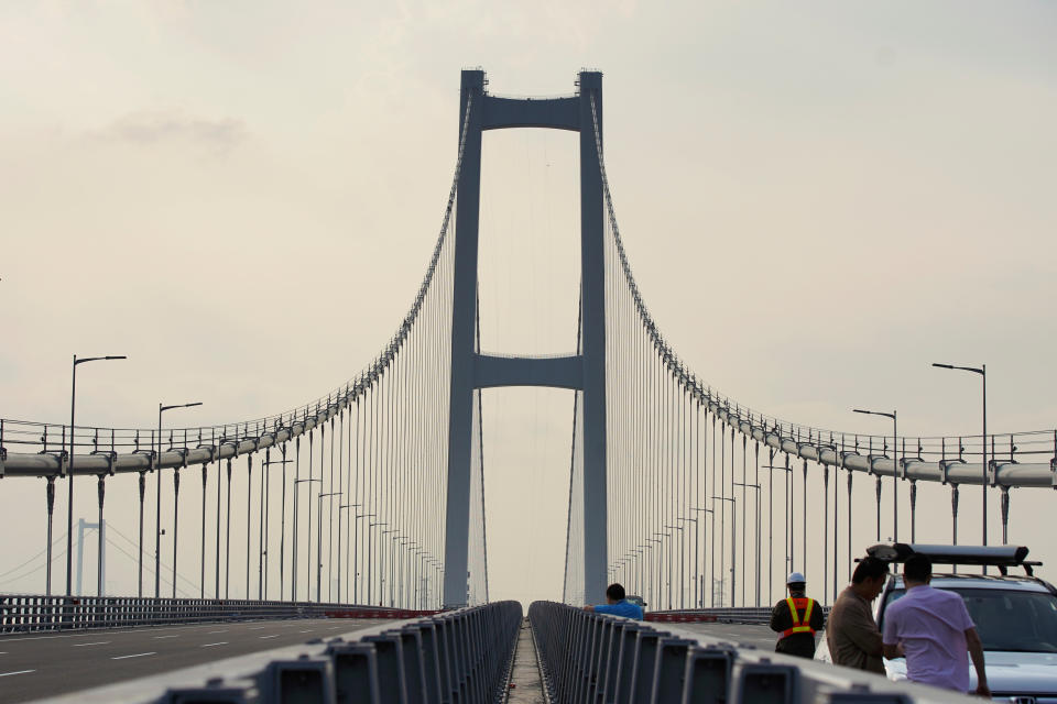 Second Humen Bridge, one of the key infrastructure in the Greater Bay Area project, is pictured before it opens to traffic, across the Pearl River in Guangzhou, Guangdong province, China March 21, 2019. Picture taken March 21, 2019.  REUTERS/Stringer  ATTENTION EDITORS - THIS IMAGE WAS PROVIDED BY A THIRD PARTY. CHINA OUT.