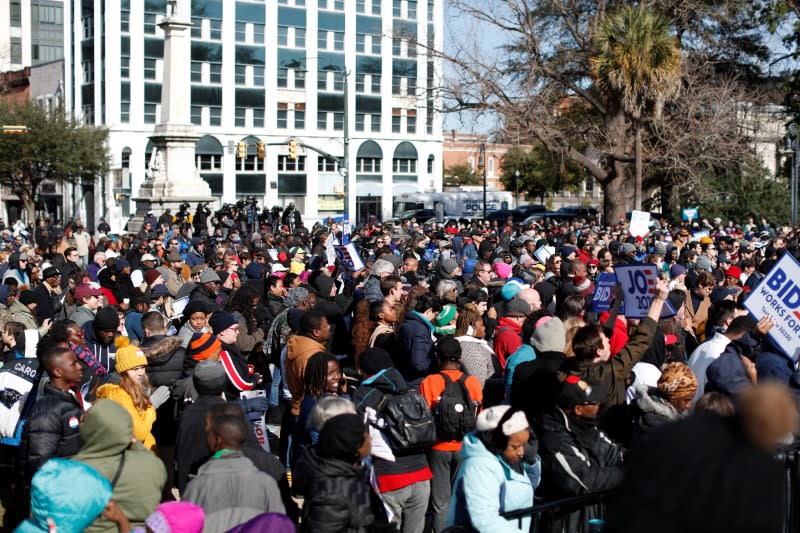 People wait to listen to seven of the Democratic U.S. presidential candidates as they speak during the Martin Luther King Jr. (MLK) Day festivities in Columbia