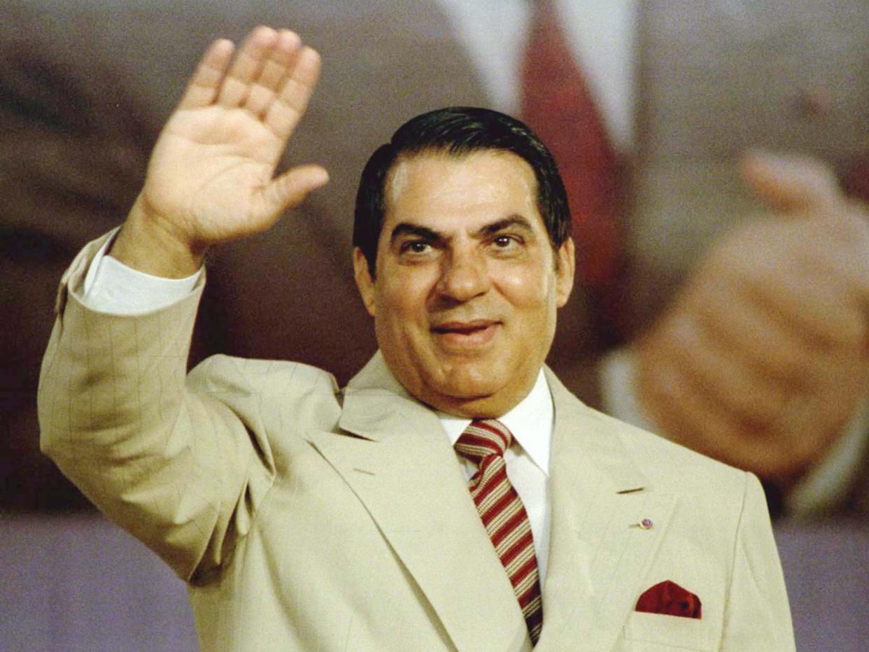 Zine al-Abidine Ben Ali waves to supporters during a Constitutional Democratic rally in 1998: Reuters