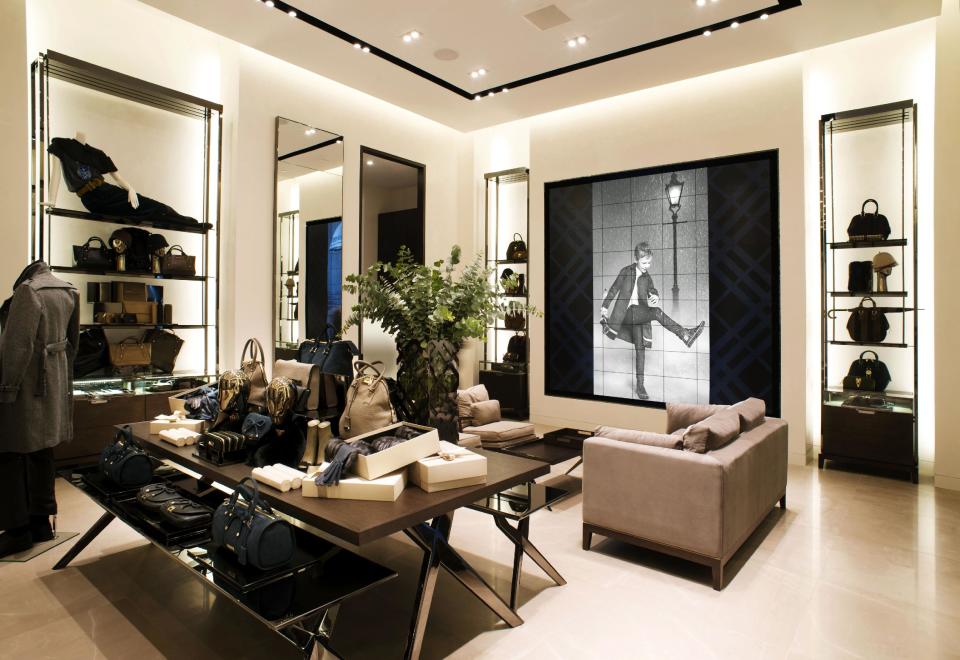 This undated publicity photo provided by BURBERRY shows an interior view of the new BURBERRY Flagship store opened in November 2012 on Michigan Avenue in Chicago. BURBERRY is interacting directly with consumers in the digital sphere too, launching projects like artofthetrench.com. The website invites users to upload pictures of themselves wearing BURBERRY trench coats. (AP Photo/BURBERRY)