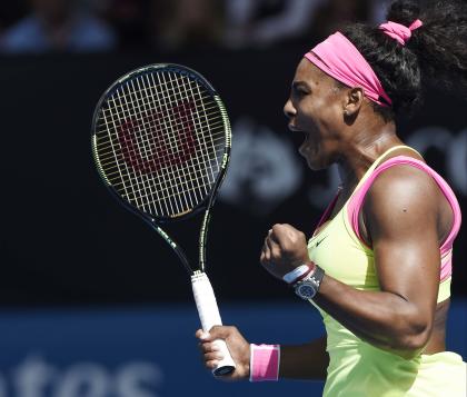 Serena Williams of the U.S. reacts after winning the first set against her compatriot Madison Keys during their semifinal match at the Australian Open tennis championship in Melbourne, Australia, Thursday, Jan. 29, 2015. (AP Photo/Andy Brownbill)