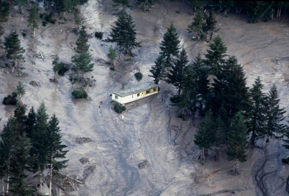 A lone trailer is caught in the flooding following in the aftermath of Mount St. Helens' eruption, which brought rapid ice and snow melt to area streams and rivers, May 20, 1980.