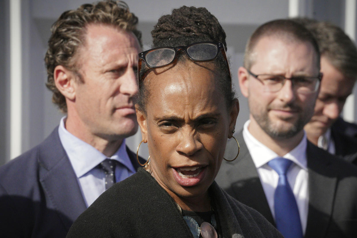 New York's Deputy Mayor for Health and Human Services Anne Williams-Isom, center, speaks during a news conference at Randall's Island Humanitarian Emergency Response and Relief Center, Oct. 18, 2022, in New York. (AP Photo/Bebeto Matthews)