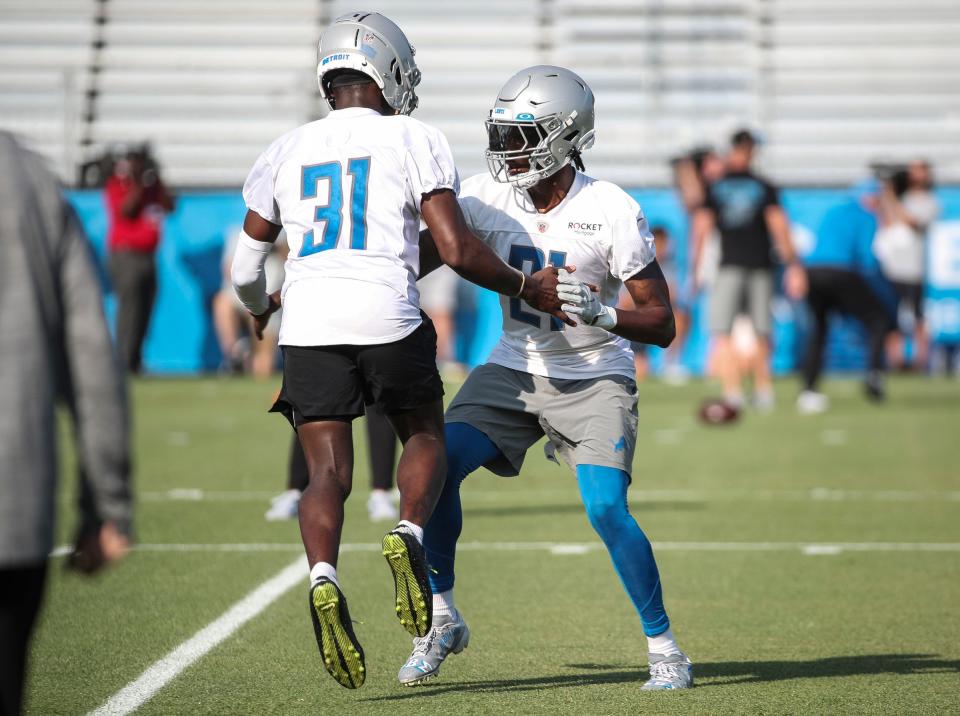 Detroit Lions safety Kerby Joseph practices with safety Tracy Walker III during training camp at Detroit Lions Headquarters and Training Facility in Allen Park on Monday, July 24, 2023.