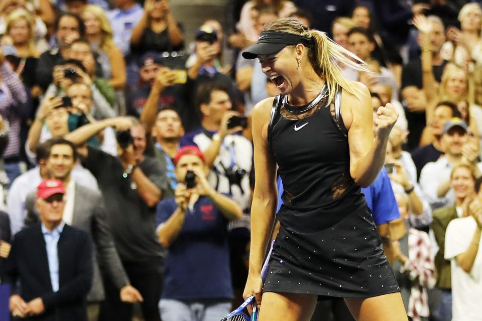 Maria Sharapova of Russia celebrates winning her first round Women's Singles match against Simona Halep of Romania on Day One of the 2017 US Open at the USTA Billie Jean King National Tennis Center on August 28, 2017 in the Flushing neighborhood of the Queens borough of New York City.