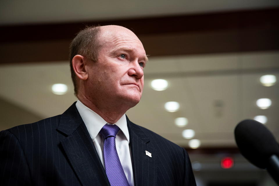 U.S. Senator Chris Coons (D-DE) speaks to reporters during a break from a Senate Armed Services and Foreign Relations joint briefing on the U.S. policy on Afghanistan, on Capitol Hill in Washington, U.S., February 2, 2022. REUTERS/Al Drago