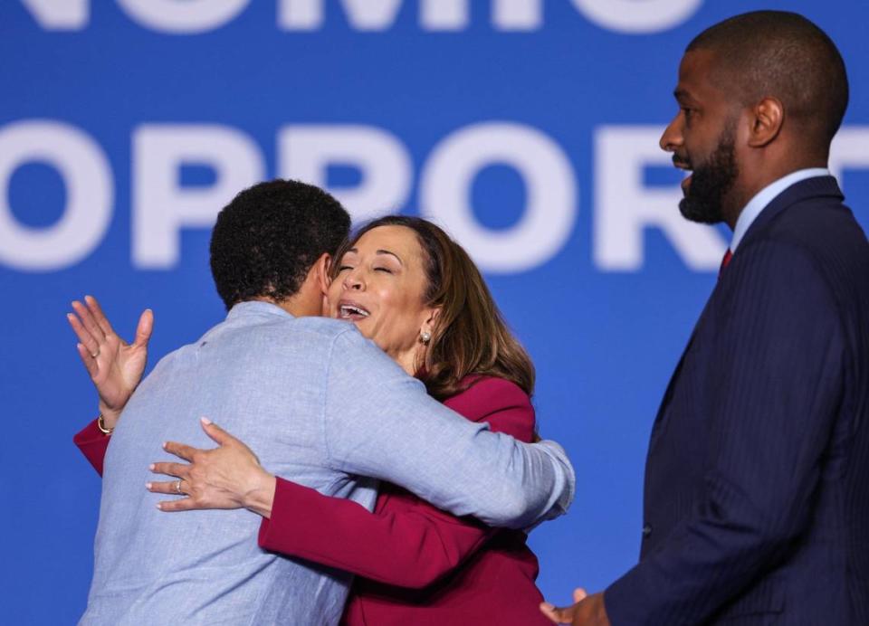 Vice President Kamala Harris is embraced by actor Michael Ealy after speaking at Johnson C. Smith University in Charlotte, NC, as part of a nationwide Economic Opportunity Tour on Wednesday, June 12, 2024.