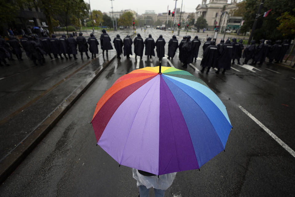 Serbian riot policemen line up to prevent anti-gay protesters from clashing with participants in the European LGBTQ pride march march in Belgrade, Serbia, Saturday, Sept. 17, 2022. Amid mounting tensions, police were deployed Saturday in downtown Belgrade where a Pride march was expected to be held despite threats from anti-gay groups and an official earlier ban. (AP Photo/Darko Vojinovic)