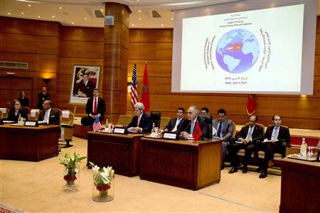 U.S. Secretary of State John Kerry (front, 2nd R) and Moroccan Foreign Minister Salaheddine Mezouar (front R) attend the opening plenary session of a bilateral strategic dialogue at the Foreign Ministry in Rabat, April 4, 2014. REUTERS/Jacquelyn Martin/Pool