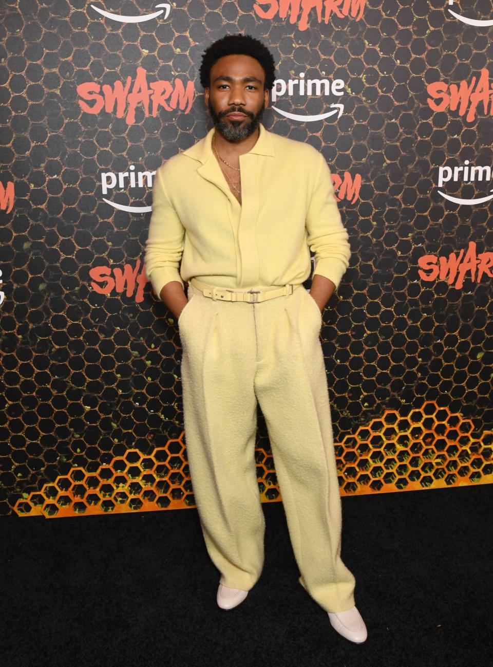 Donald Glover, wearing a nubby Zegna set, at the Swarm premiere in 2023.